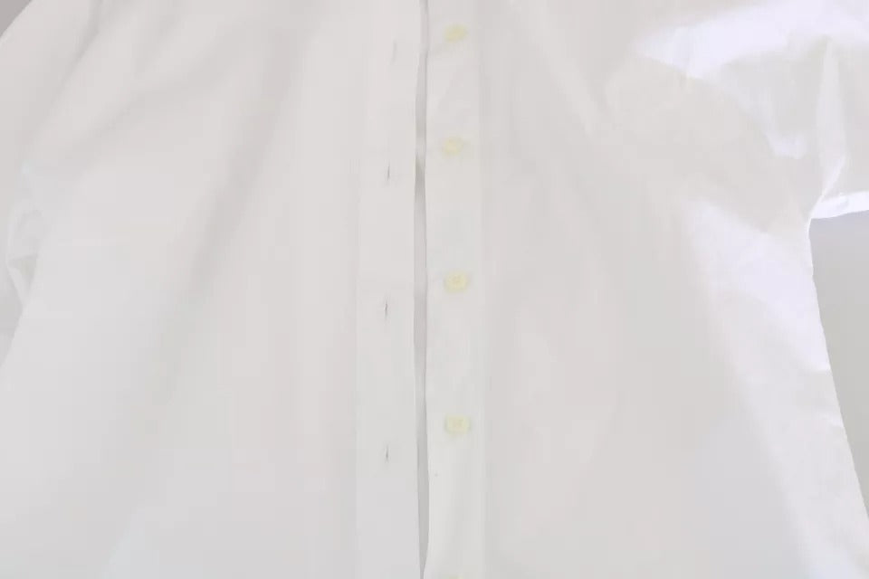 Chemise polo blanche à col avec manches courtes de Dolce & Gabbana, vue de face, tissu léger et élégant.
