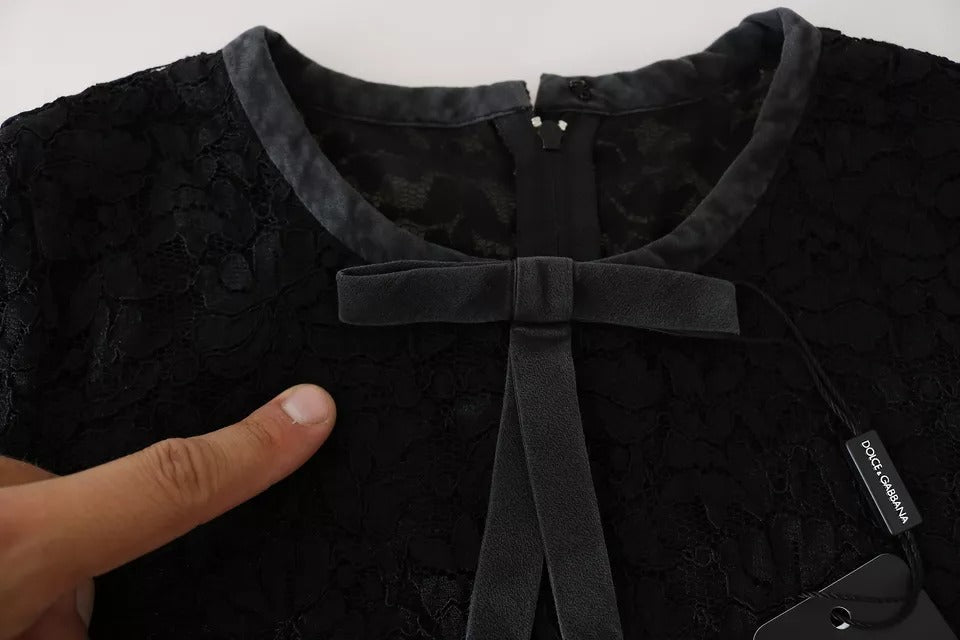 Blouse en dentelle noire à manches longues de Dolce & Gabbana, haut en nylon élégant et sophistiqué.