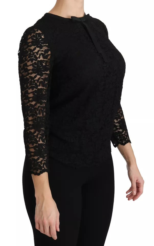 Blouse en dentelle noire à manches longues de Dolce & Gabbana, haut en nylon élégant et sophistiqué.