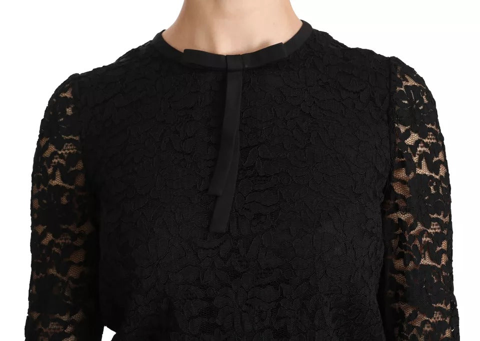 Blouse en nylon noire à manches longues en dentelle Dolce & Gabbana, détails élégants et design sophistiqué.