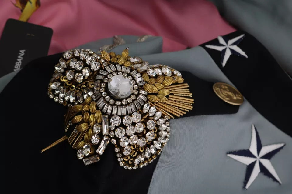 Veste en coton bleu Dolce & Gabbana avec boutons et embellissements en cristal, élégante et sophistiquée.
