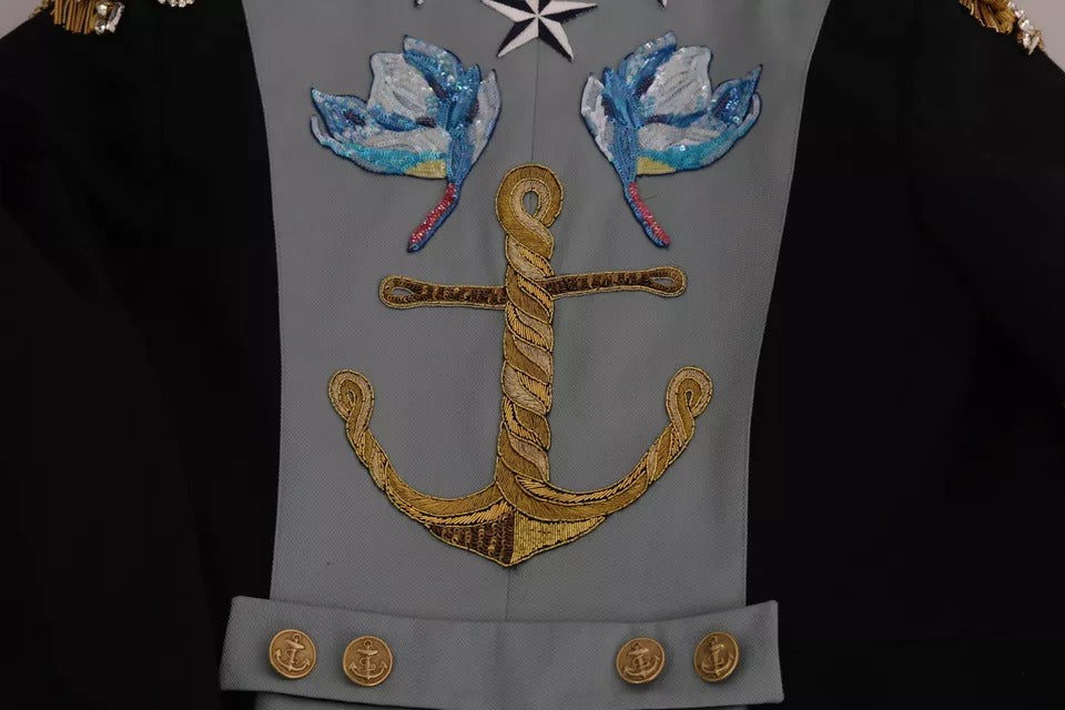 Veste en coton bleu Dolce & Gabbana avec boutons et embellissements en cristal, élégante et sophistiquée.