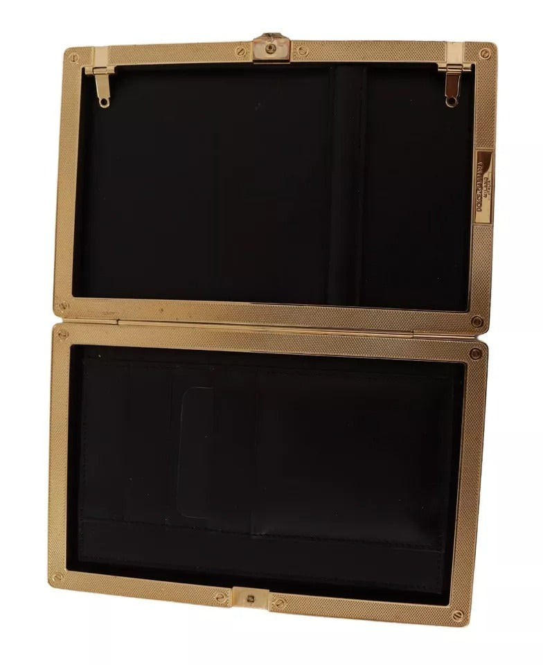 Sac clutch en soie noire Dolce & Gabbana avec cadre or, parfait pour soirée et événement élégant.