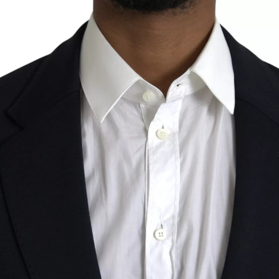 Veste blazer en laine bleue Dolce & Gabbana à col cranté et fermeture simple, élégante et sophistiquée.