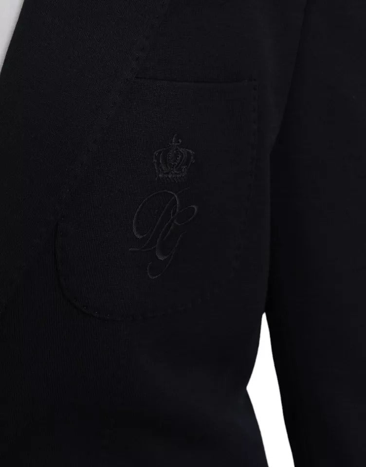 Veste blazer en laine bleue Dolce & Gabbana à col cranté, coupe simple boutonnage single breasted, élégante et sophistiquée.