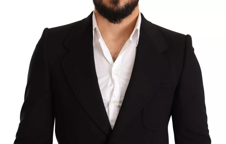 Manteau blazer en laine noire Dolce & Gabbana, coupe ajustée, élégant et moderne, porté sur un mannequin.