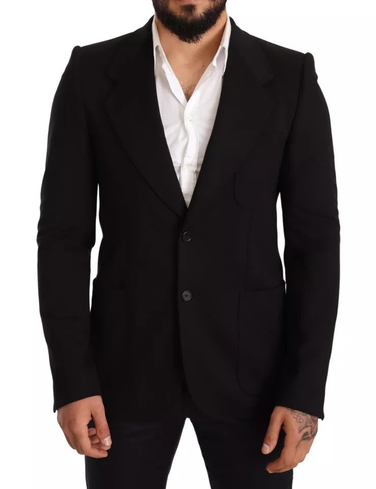 Manteau blazer noir en laine Dolce & Gabbana, coupe slim, porté sur un mannequin, détails élégants et finition raffinée.