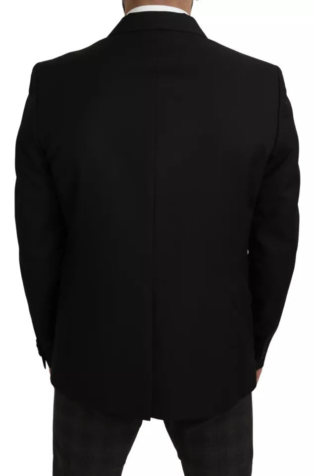 Blazer en laine noire Dolce & Gabbana, coupe slim, avec revers crantés et pochettes élégantes, pour un style sophistiqué.