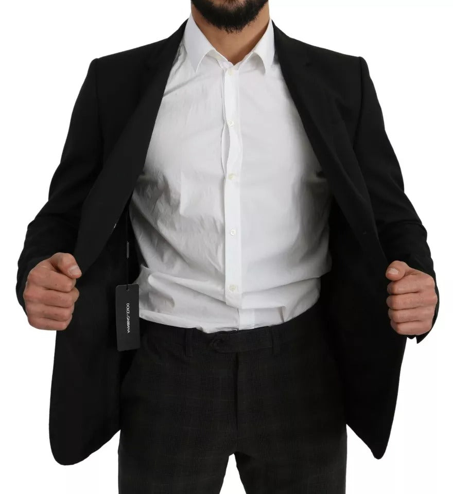 Veste blazer noire en laine à coupe slim de Dolce & Gabbana, modèle avec col à revers et fermeture boutonnée élégante.