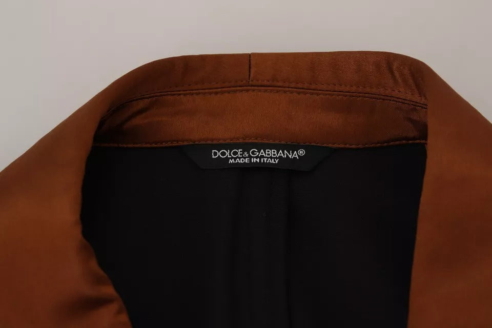 Veste blazer en soie de Dolce & Gabbana avec motif bronze de singe, coupe slim, élégante et sophistiquée.