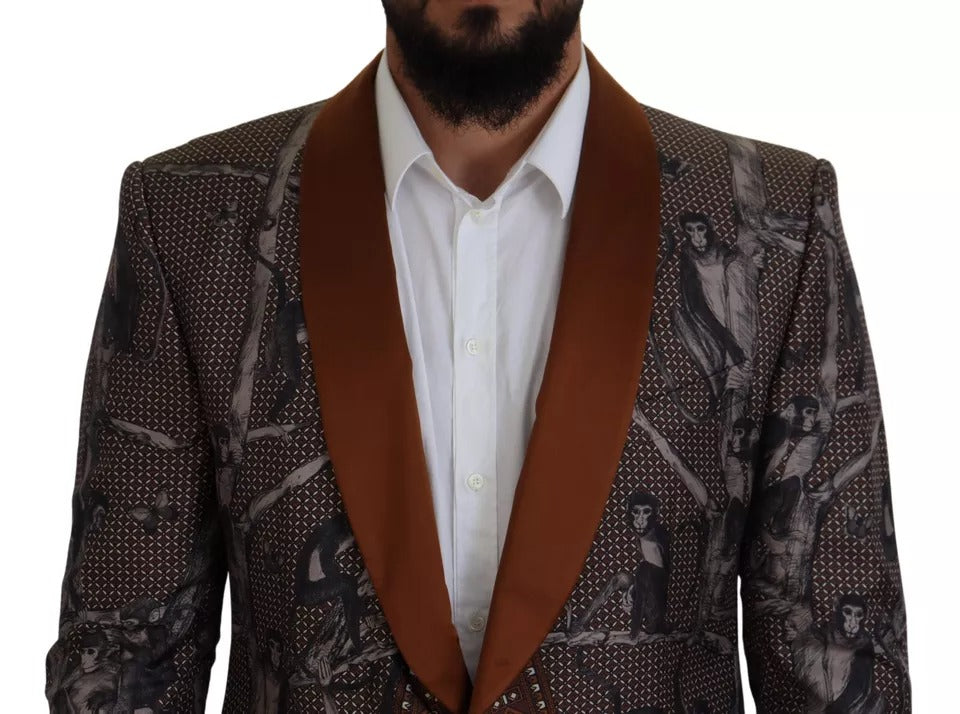 Veste blazer en soie Dolce & Gabbana avec motif de singe bronze, coupe slim, élégante et sophistiquée.