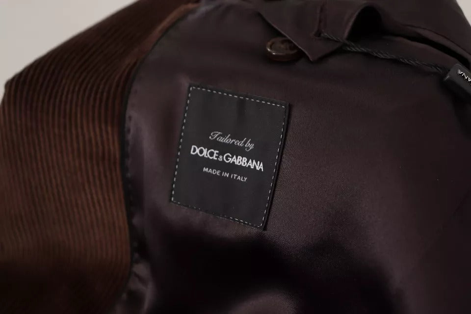 Veste blazer en velours côtelé marron Dolce & Gabbana avec logo DG, coupe slim fit et style élégant.