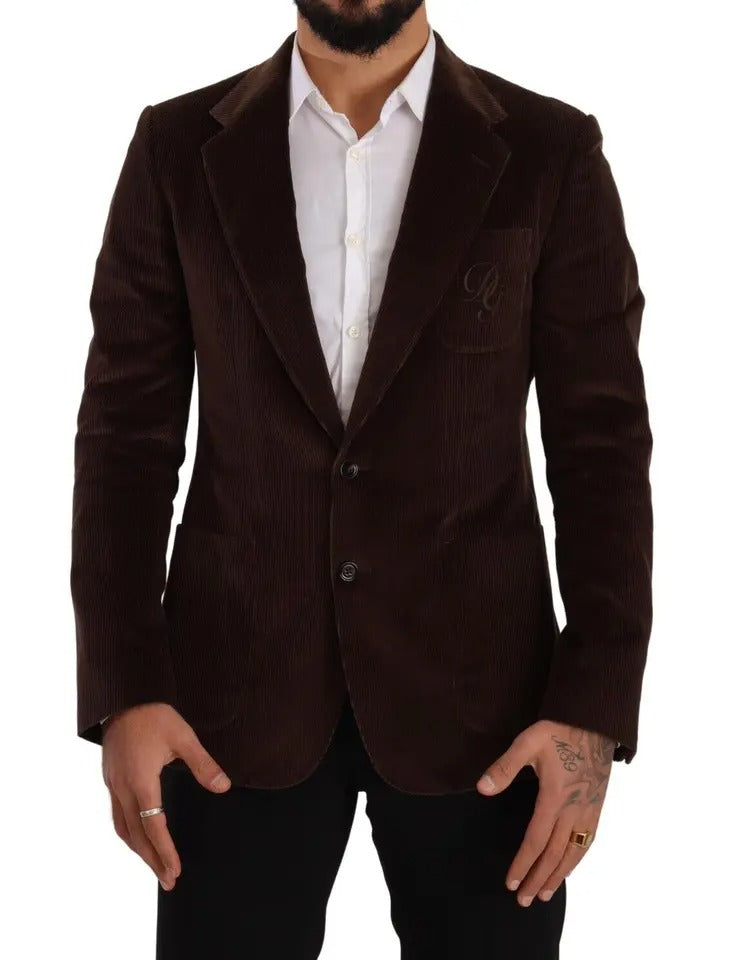 Manteau en velours côtelé marron Dolce & Gabbana, coupe slim, avec logo DG visible sur la poitrine.