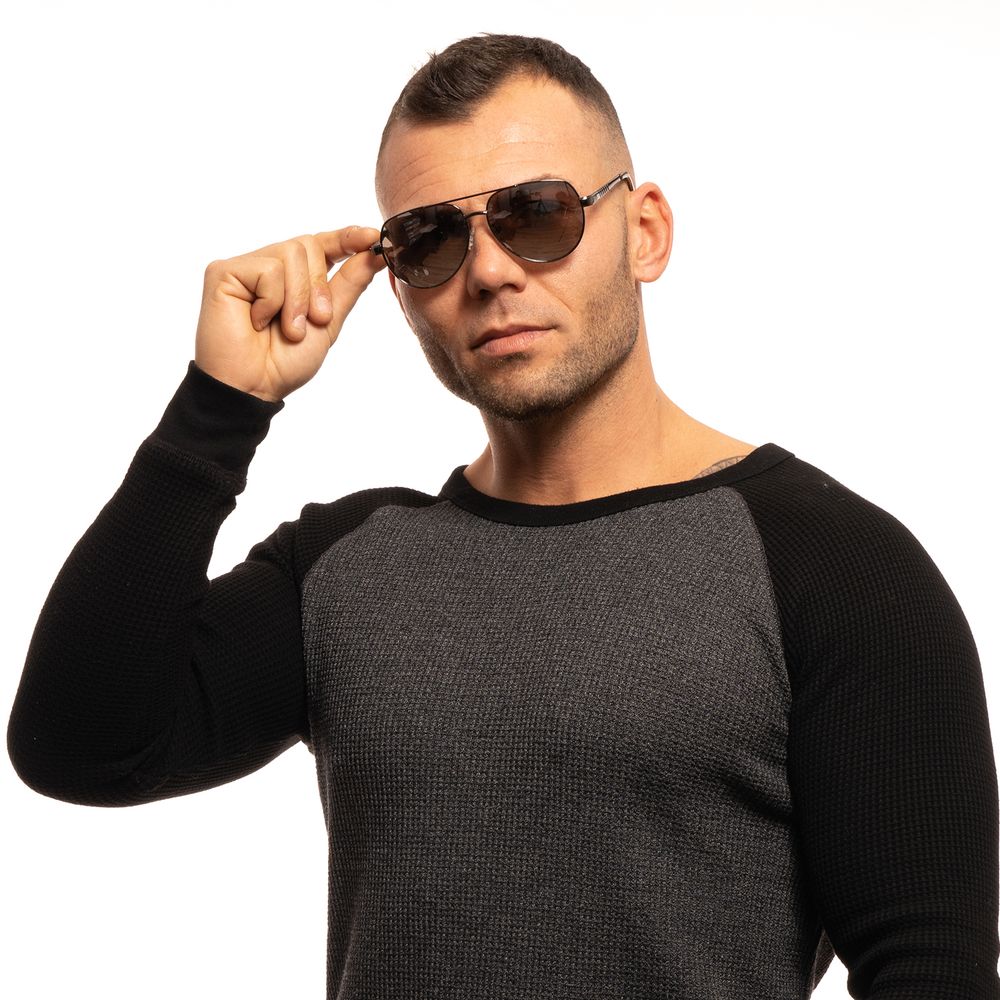 Lunettes de soleil grises en métal de marque Guess avec monture élégante et design moderne.