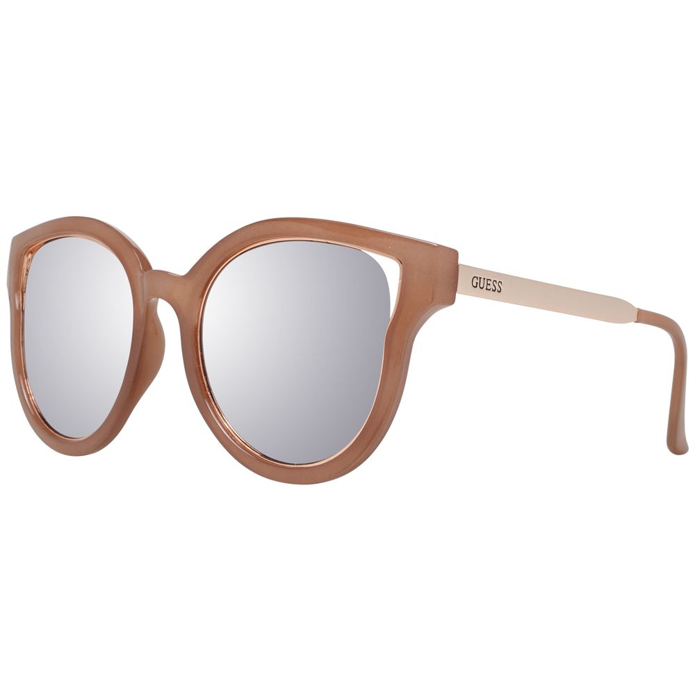 Lunettes de soleil Guess en métal et plastique marron avec monture élégante et branches épaisses.