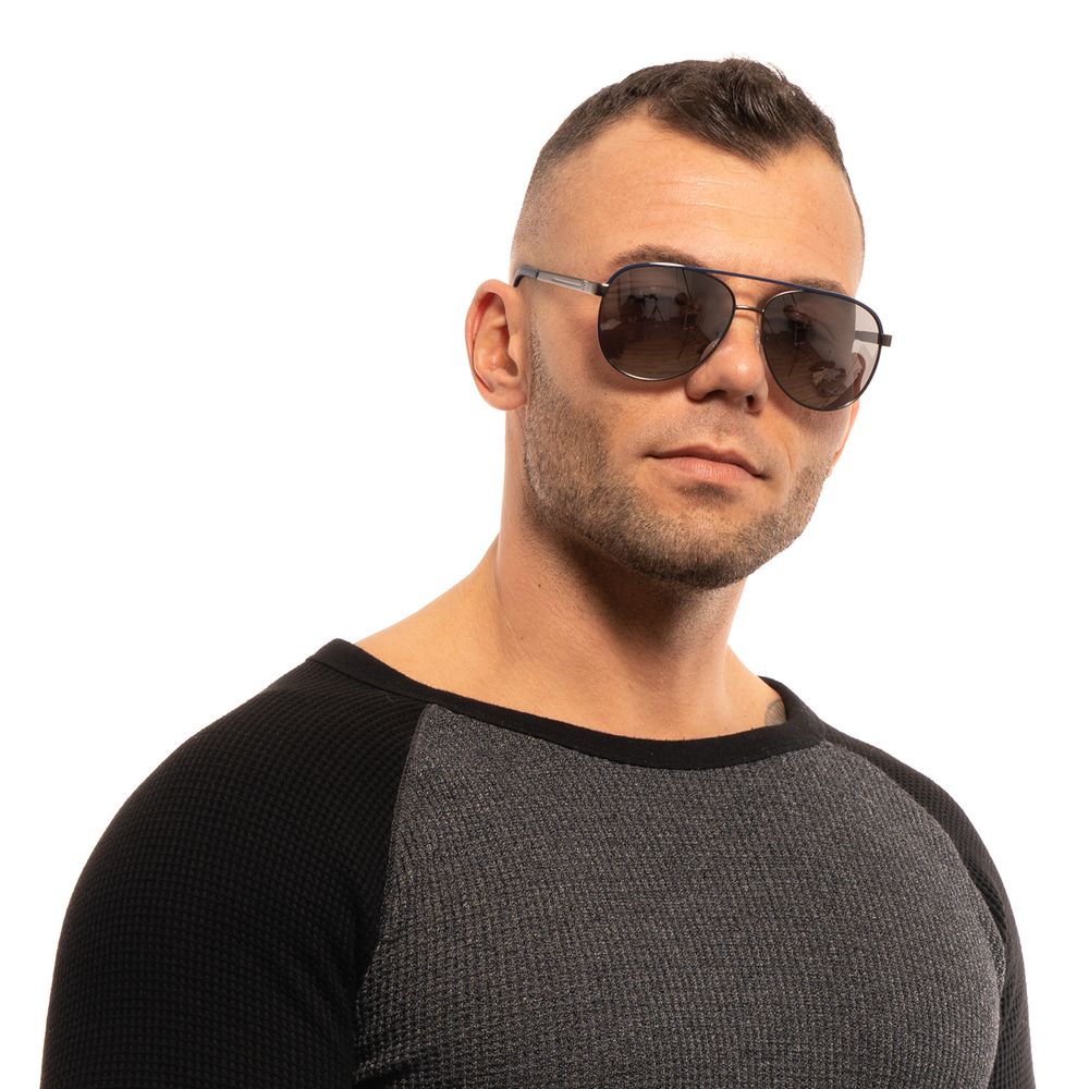 Lunettes de soleil en métal gris Guess avec monture fine et branches délicates, vue de face.