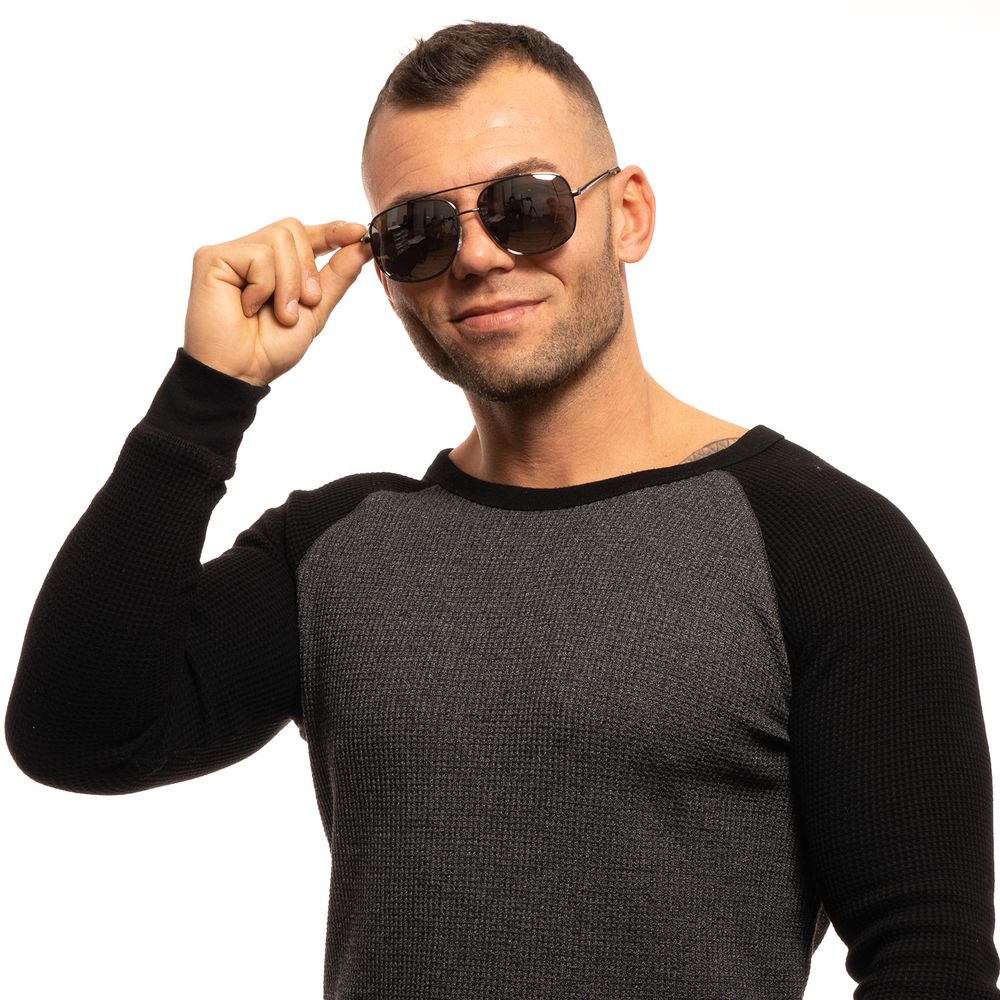 Lunettes de soleil métalliques grises Guess pour homme, monture élégante et moderne, avec verres teintés.