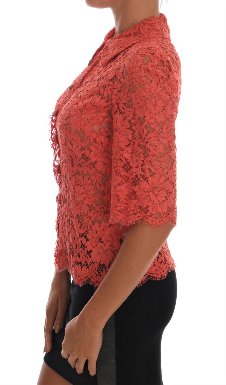 Blouse en dentelle florale orange avec boutons en cristal Dolce & Gabbana, vue de face.