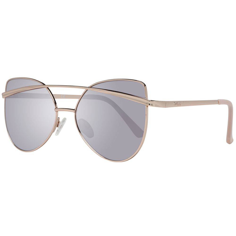 Lunettes de soleil en métal rose gold de Guess, style élégant avec monture fine et verres teintés, pour un look tendance.