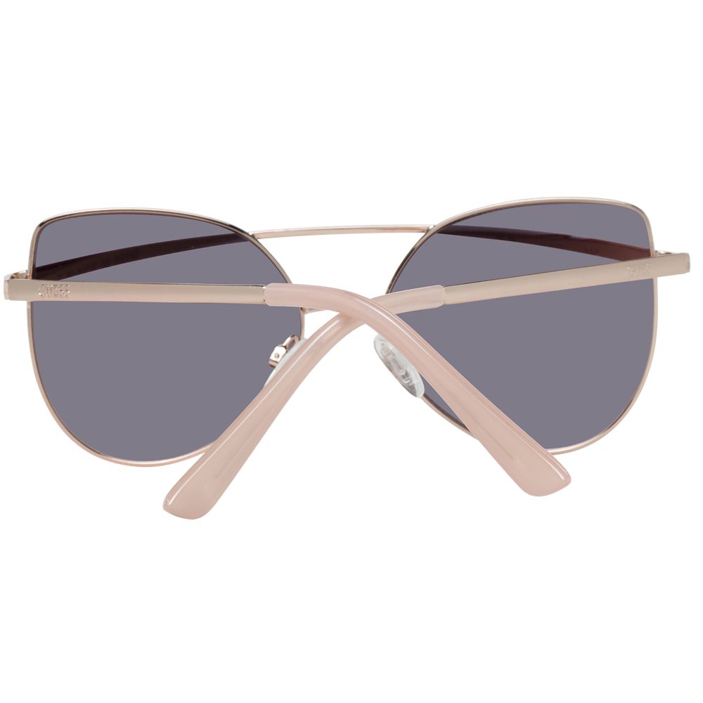 Lunettes de soleil en métal or rose Guess, style élégant avec monture fine et verres teintés, pour un look tendance et sophistiqué.
