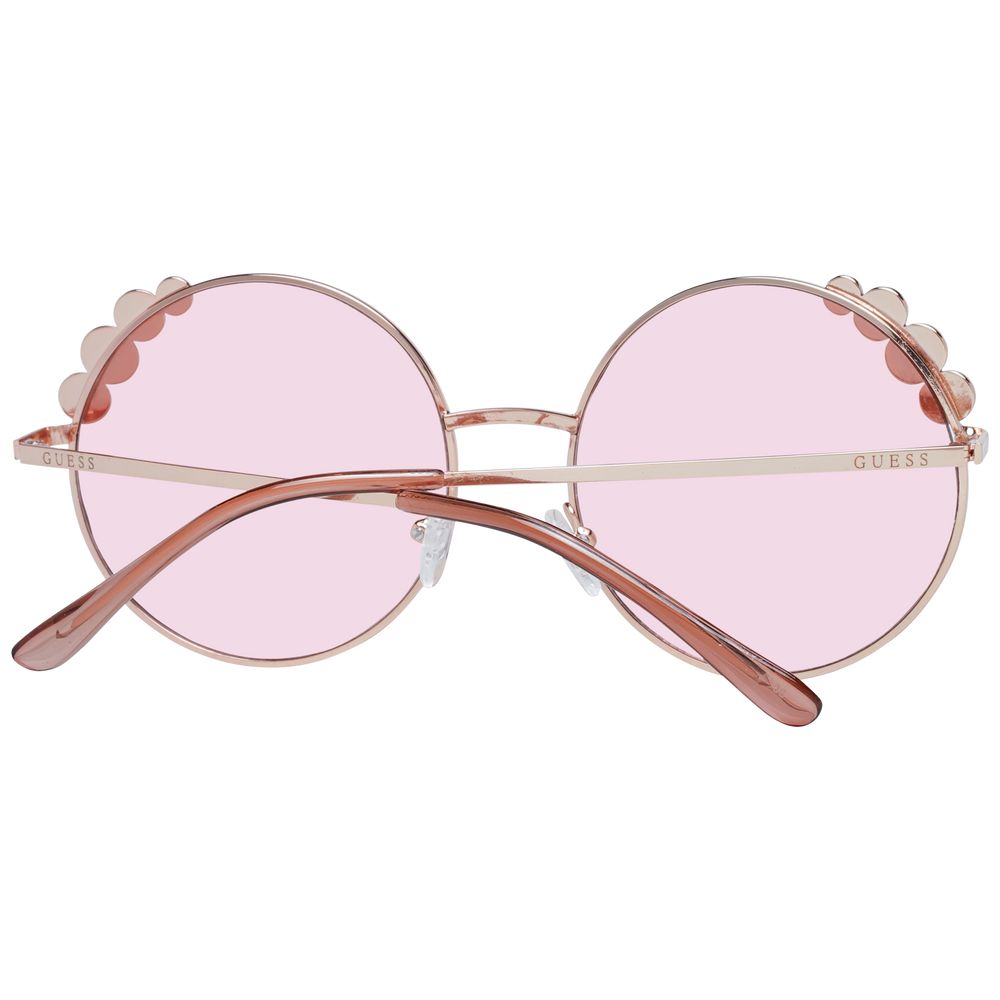 Lunettes de soleil en métal doré rose Guess, monture élégante avec verres teintés, mode chic et tendance.