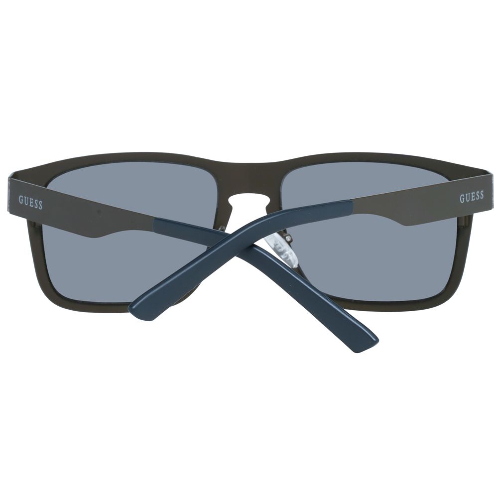 Lunettes de soleil en métal gris Guess, style moderne avec monture rectangulaire et verres teintés, pour un look sophistiqué