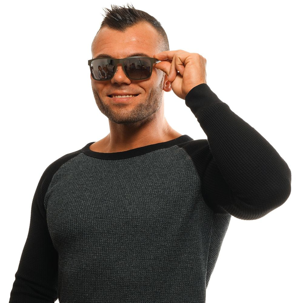 Lunettes de soleil en métal gris Guess avec monture élégante et design moderne, vues de face sur fond blanc.