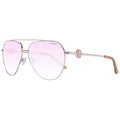 Lunettes de soleil en métal rose doré Guess, style tendance avec monture élégante et branches fines, parfaites pour l'été.