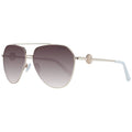 Lunettes de soleil en métal doré Guess pour hommes ou femmes, style élégant avec monture fine et verres teintés.