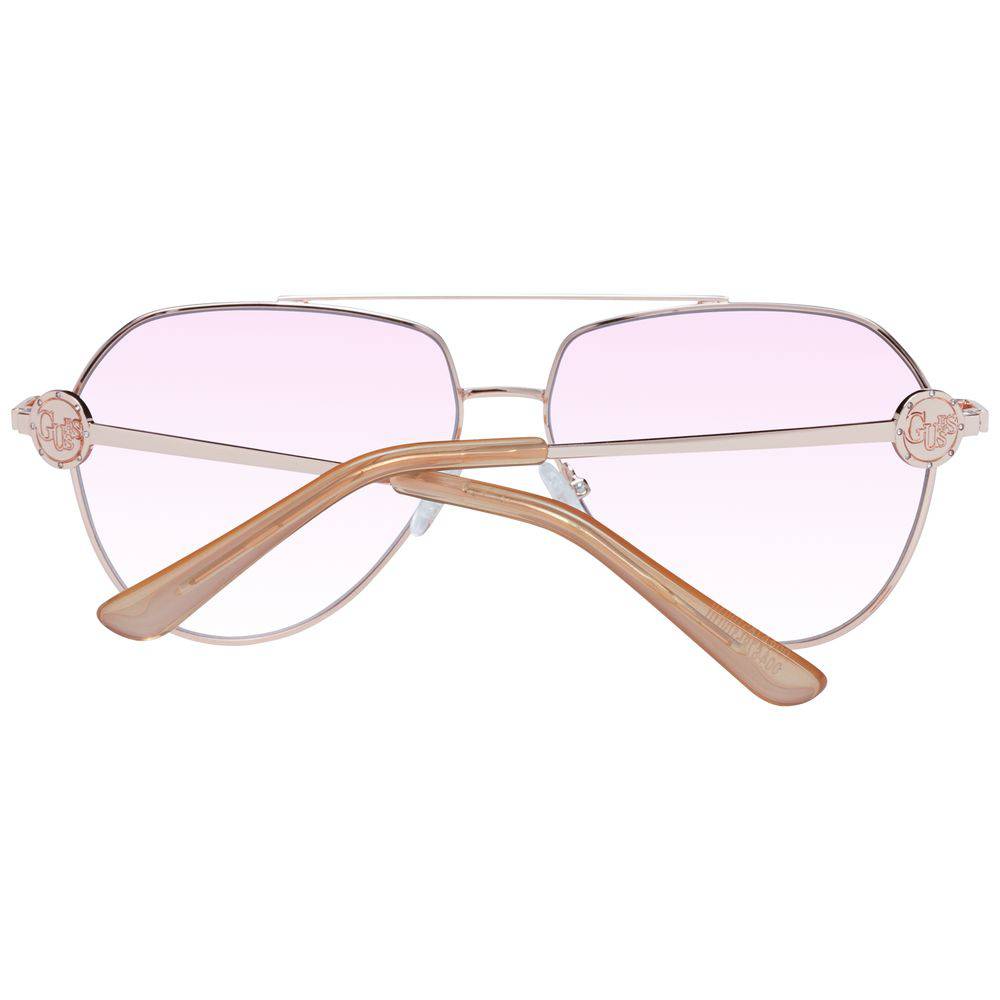 Lunettes de soleil en métal rose or Guess avec monture élégante et design moderne, parfaites pour un style tendance.