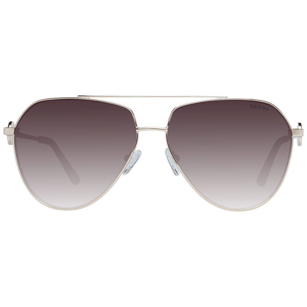 Lunettes de soleil en métal doré Guess, lunettes de soleil tendance avec monture fine et design élégant visible sur l'image.