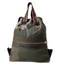 Sac à dos Dolce & Gabbana vert militaire en patchwork avec plusieurs poches et détails en tissu robuste.