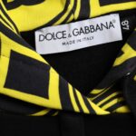 Sweat à capuche en coton noir Dolce & Gabbana avec logo, style décontracté et moderne, visible sur l'image.