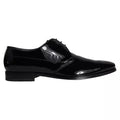 Chaussures derby en cuir de veau noir de Dolce & Gabbana pour homme, élégantes et sophistiquées.