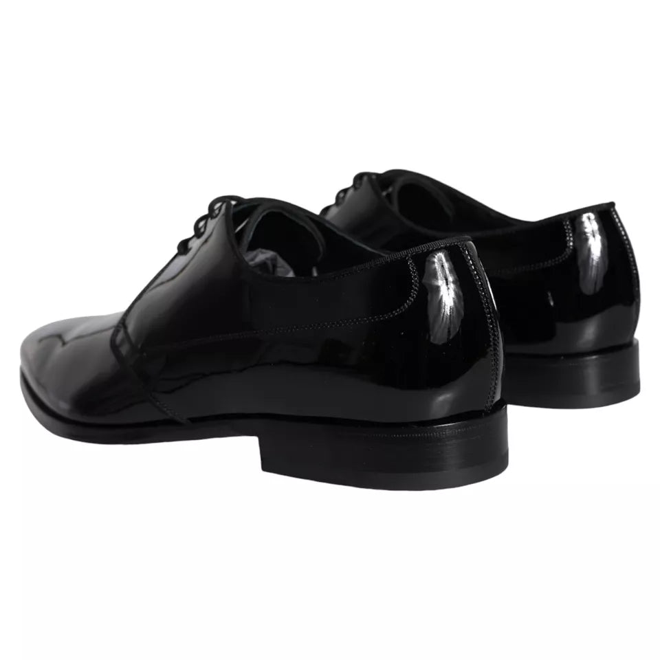 Chaussures derby pour homme Dolce & Gabbana en cuir de veau noir, élégantes et classiques, avec semelle en cuir.