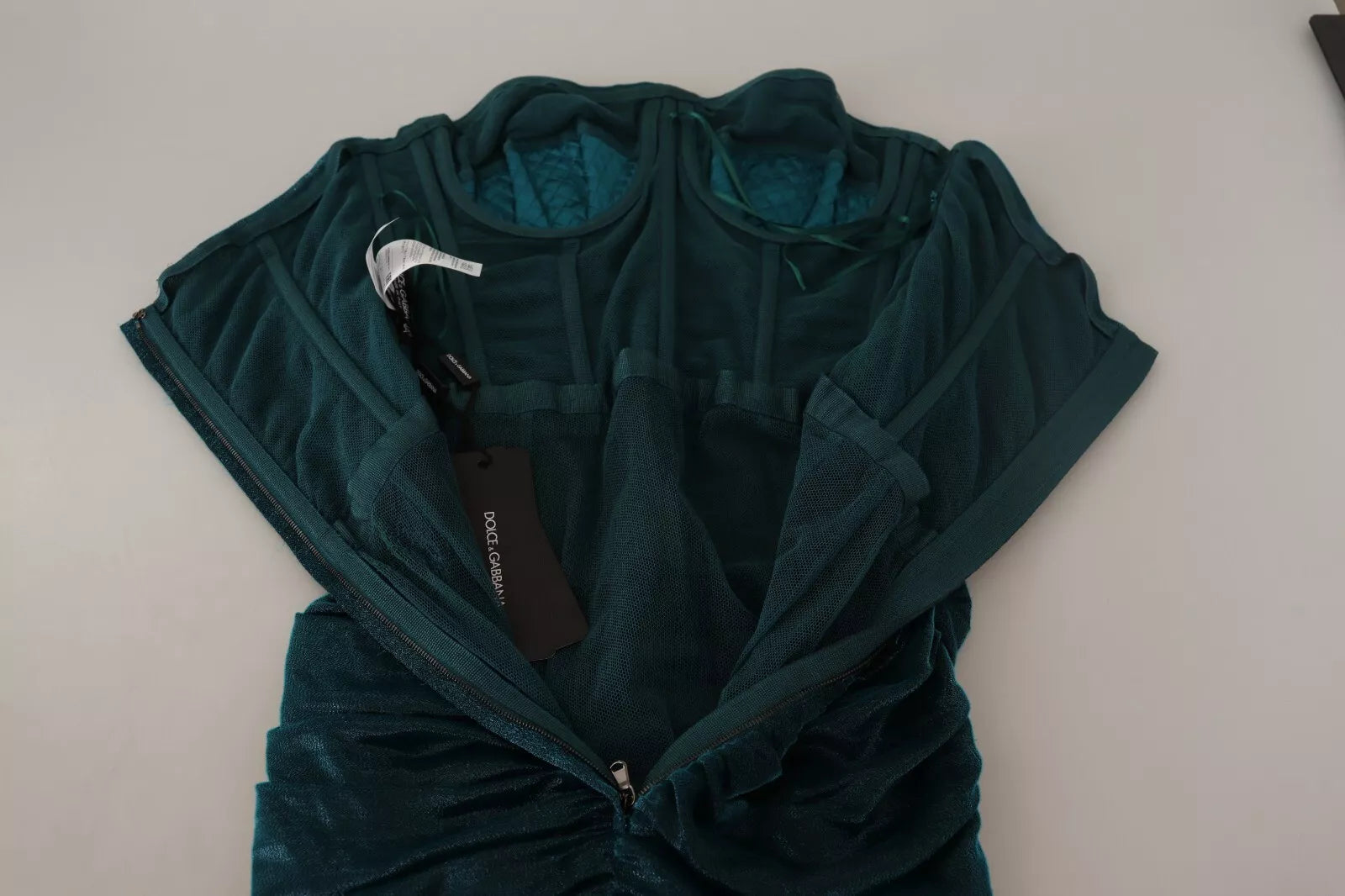 Robe midi bustier turquoise Dolce & Gabbana avec drapé élégant et silhouette flatteuse, vue de face.