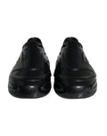 Chaussures sneakers basses noires Dolce & Gabbana en caoutchouc brillant avec détails en relief, pour homme.