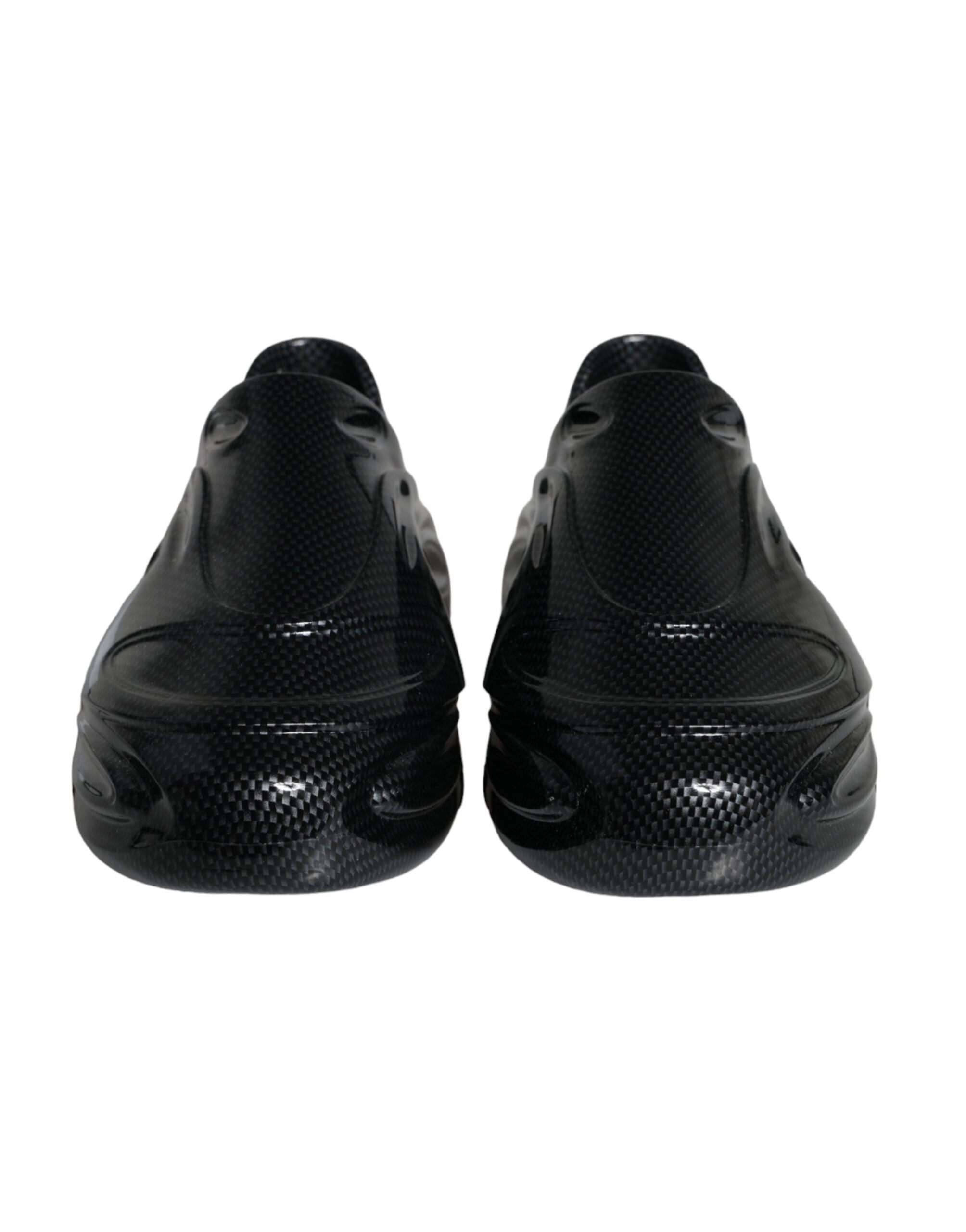 Chaussures sneakers basses noires Dolce & Gabbana en caoutchouc brillant avec détails en relief, pour homme.