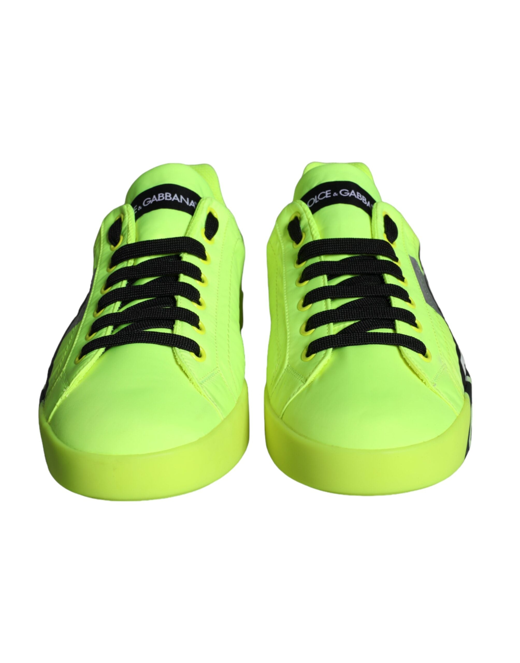 Chaussures sneakers basses Dolce & Gabbana avec bande logo verte néon et design moderne, vues de côté.