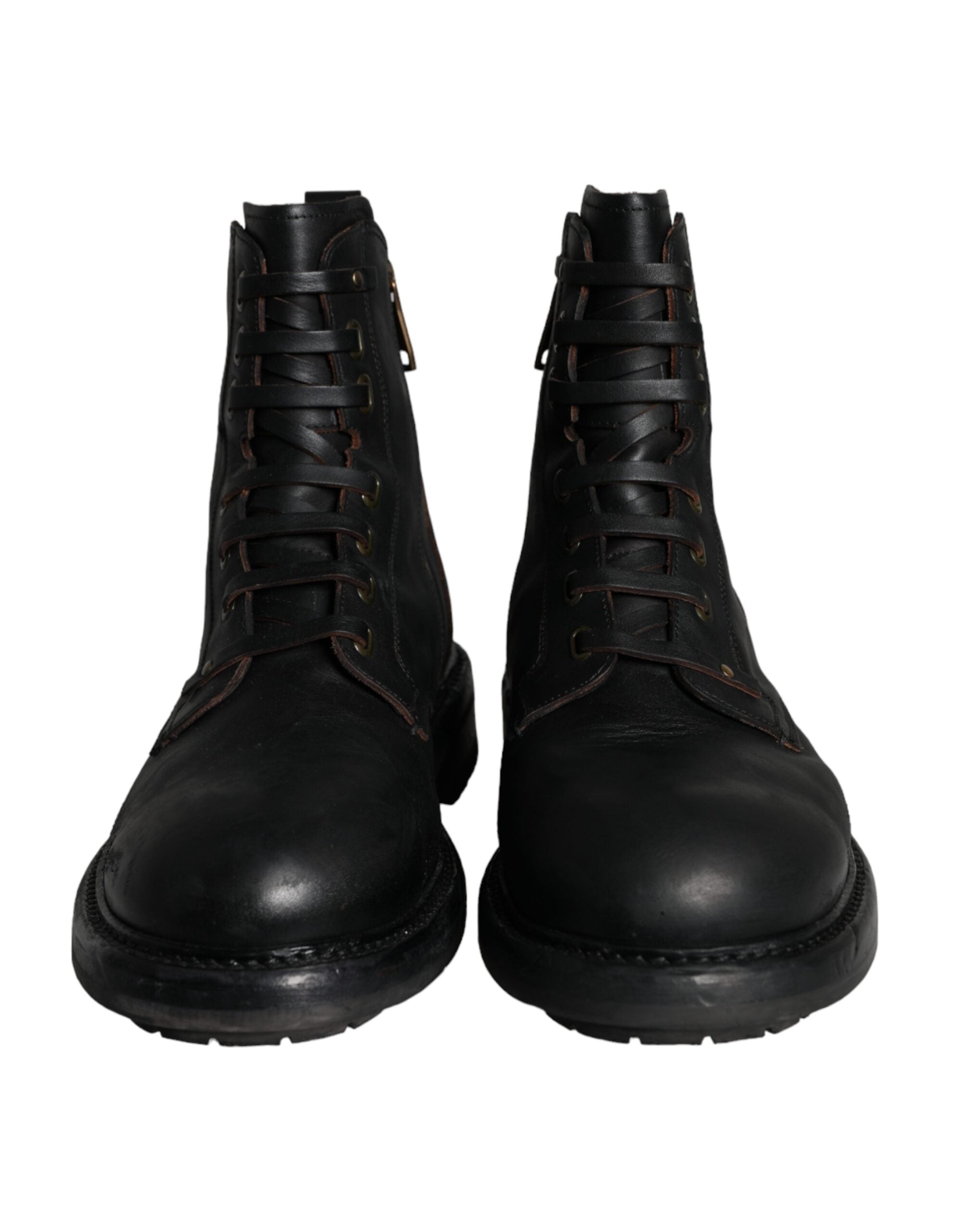 Bottes homme Dolce & Gabbana en cuir noir à lacets mi-mollet, style élégant et moderne.