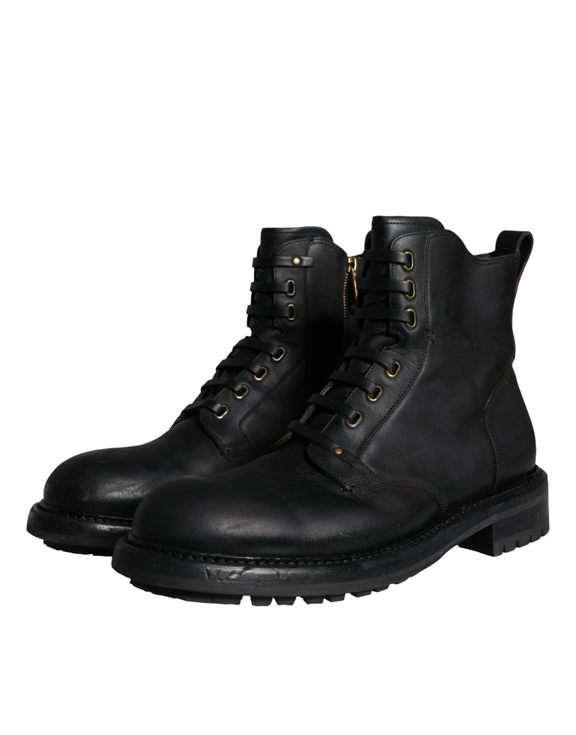 Bottes homme Dolce & Gabbana en cuir noir avec lacets, mi-mollet, style élégant et sophistiqué.