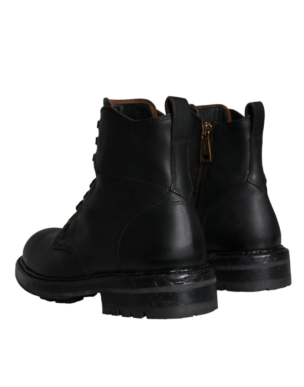 Bottes noires Dolce & Gabbana en cuir avec laçage mi-mollet pour homme, style élégant et moderne.