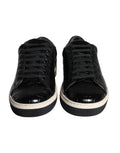 Chaussures sneakers basses en cuir noir pour homme de Dolce & Gabbana, vue de face, détails du design élégant.