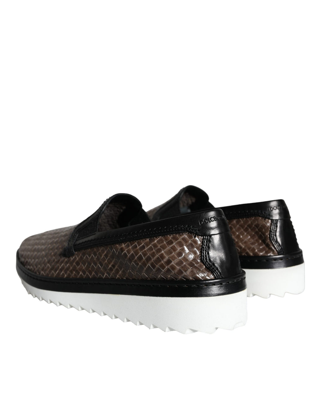 Chaussures mocassins en cuir marron et noir tressé pour homme de la marque Dolce & Gabbana, visibles avec détails du cuir.