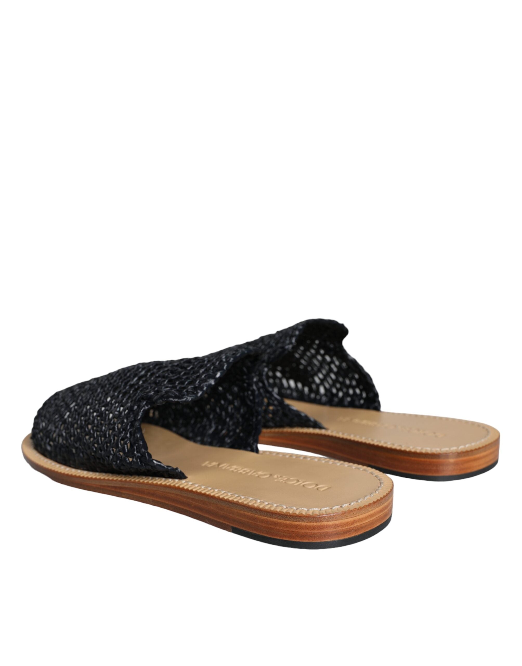 Sandales Dolce & Gabbana en raffia monochrome noires avec tressage, vue de face.