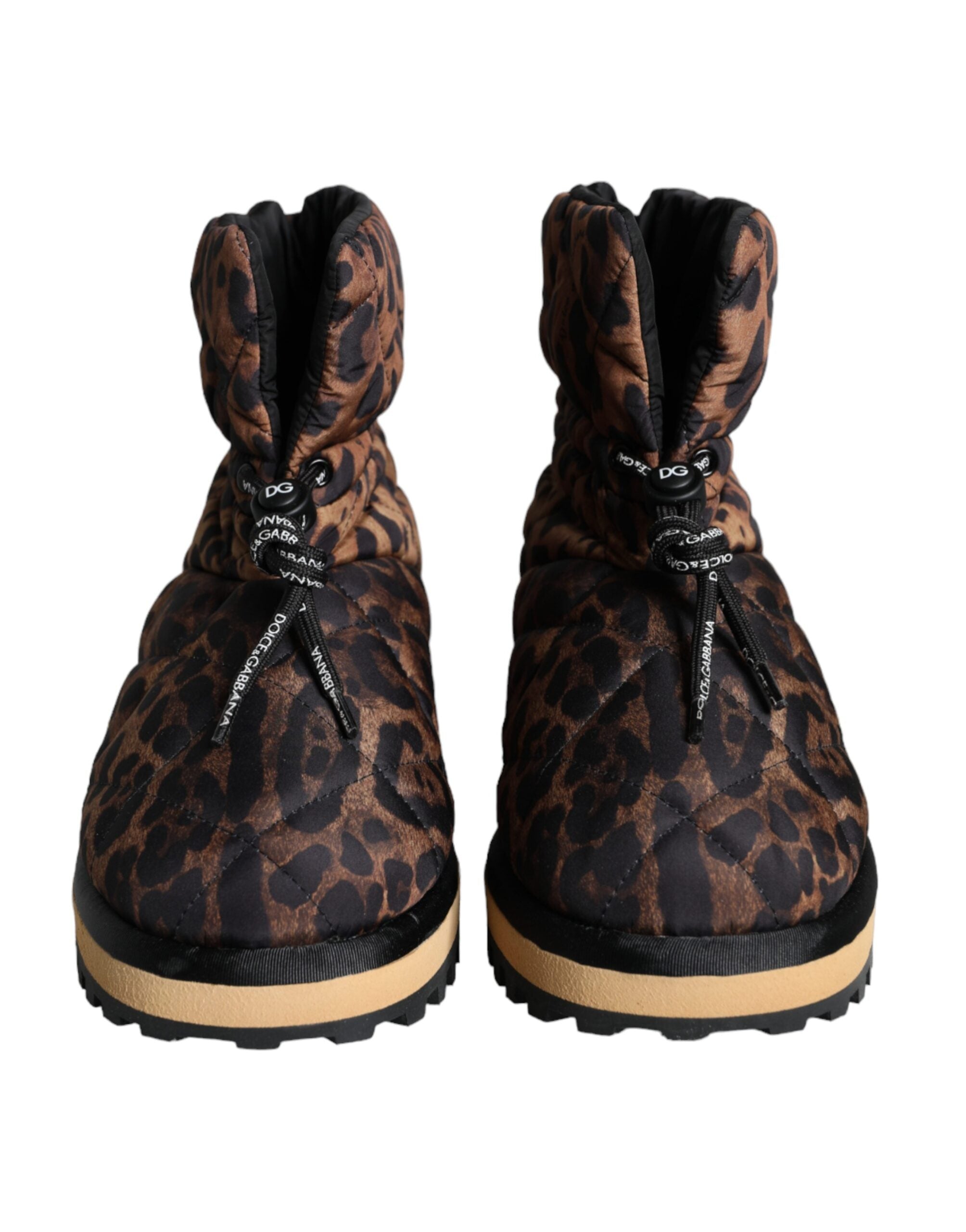 Bottes d ankle Dolce & Gabbana en cuir marron à motif léopard rembourré, style élégant et tendance.