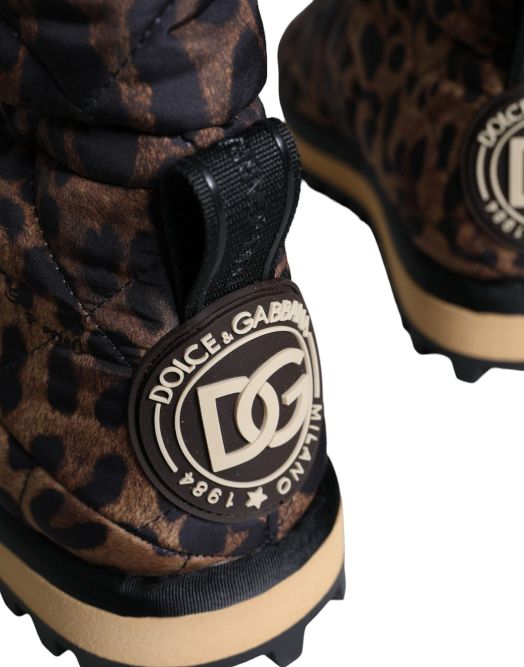 Boots à talon ankle Dolce & Gabbana en cuir brun avec motif léopard rembourré et semelle antidérapante.