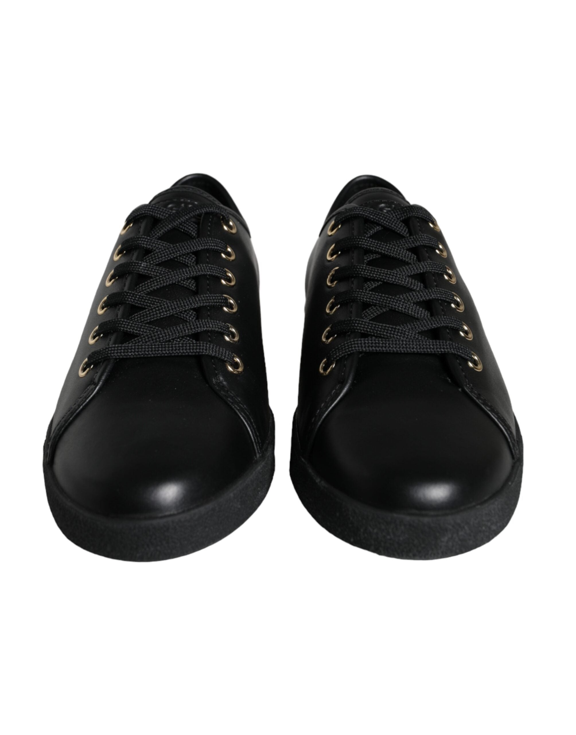 Chaussures sneakers classiques en cuir noir et or de Dolce & Gabbana, vue de face avec détails élégants.