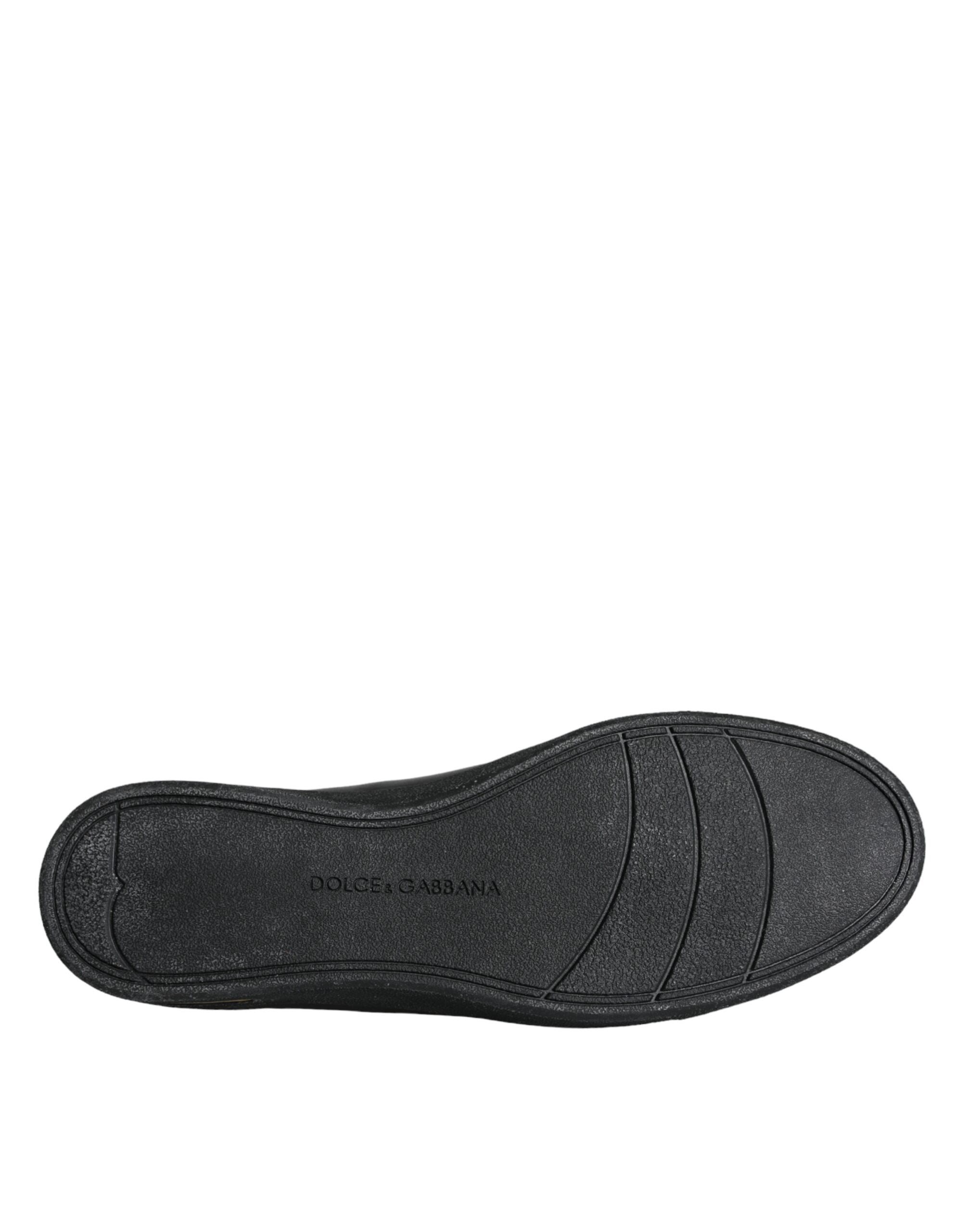 Chaussures sneakers classiques en cuir noir et or Dolce & Gabbana, style élégant avec détails de luxe.