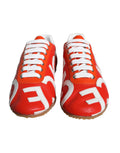 Chaussures sneakers décontractées en cuir rouge et blanc de Dolce & Gabbana avec logo visible, pour un style casual et élégant.